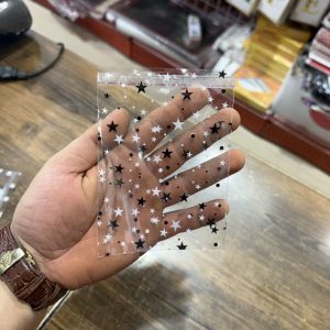 سلفون کوکی ۱۰×۱۰ طرح ستاره مشکی سفید